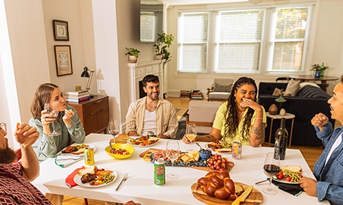 a group of people eating dinner