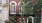 a brick building with trees in front of it