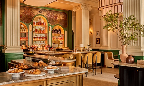 a bar with pastries on a table