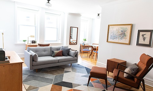 living room with couch and chairs