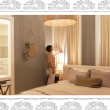 woman looking out of bedroom window