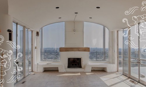 wood burning fireplace in sun filled room
