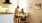 a man and woman sitting at a table in a kitchen