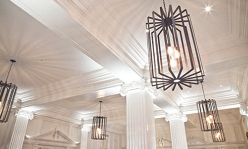 chandeliers in a white room